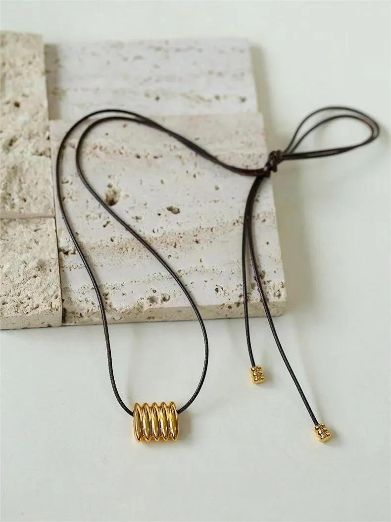 Long Black Leather Necklace with Striped Geometric Pendant