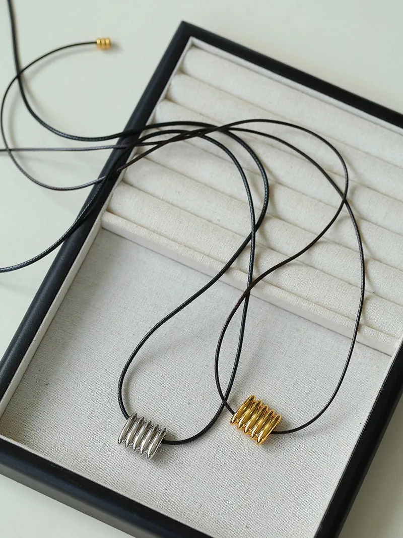 Long Black Leather Necklace with Striped Geometric Pendant