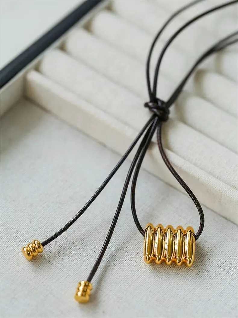 Long Black Leather Necklace with Striped Geometric Pendant